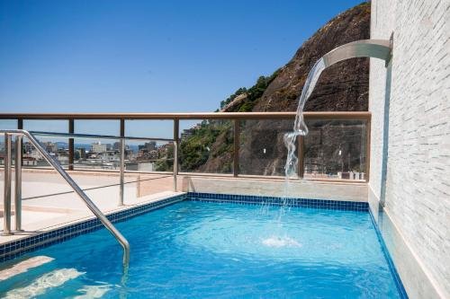 Hotel Atlântico Rio (2n) + Pousada New Paradise (5n)